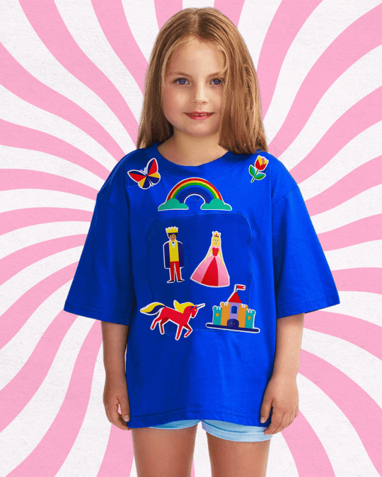 Girl wearing a blue TeeBoo™ interactive kids T-shirt with the Fairy Sparkle BooPatch™ gift-ready set for creative screen-free play.