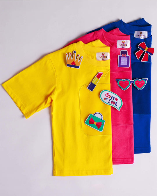 Yellow, blue and pink TeeBoo™ interactive kids T-shirts with the Queen of Cool BooPatch™ gift-ready collection by SASHABOO.