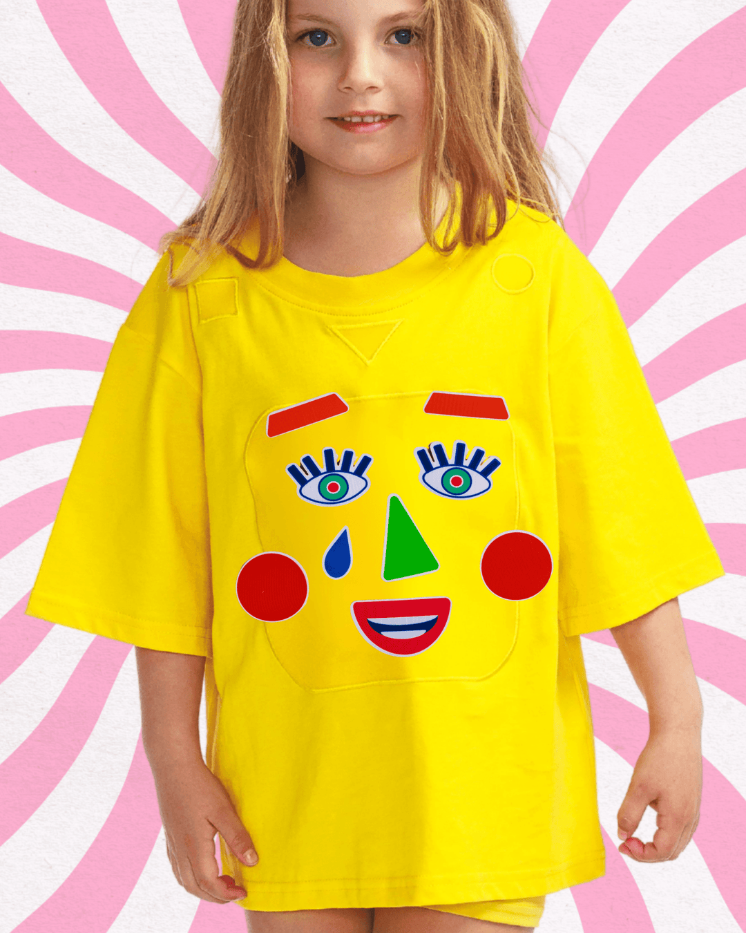 Girl wearing a yellow TeeBoo™ interactive kids T-shirt with the Moody Friends BooPatch™ gift-ready set for creative screen-free play.