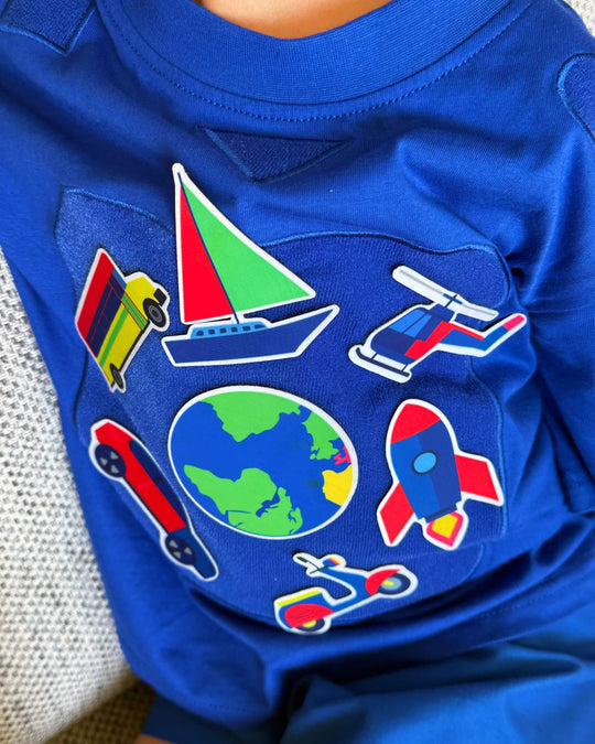 Close-up of a blue TeeBoo™ interactive kids T-shirt with the SpeedyBoo BooPatch™ set during imaginative play.