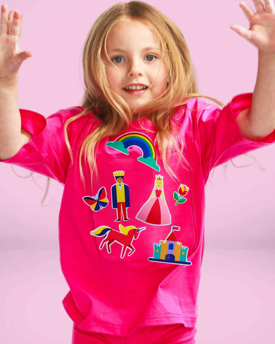 Girl wearing a pink TeeBoo™ interactive kids T-shirt with the Fairy Sparkle BooPatch™ gift-ready set for creative screen-free play.
