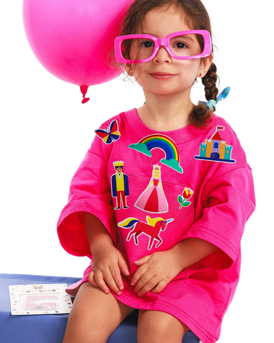 Girl wearing a pink TeeBoo™ interactive kids T-shirt with the Fairy Sparkle BooPatch™ gift-ready set by SASHABOO.