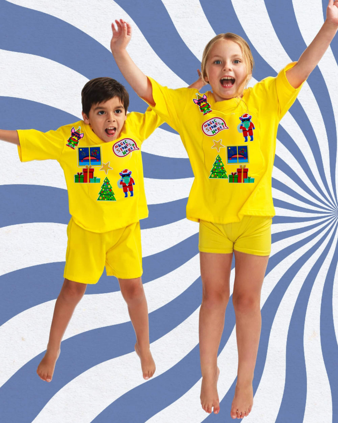 Boy and Girl wearing a yellow TeeBoo™ interactive T-shirt with Christmas BooPatch™ set – SashaBoo festive gift set